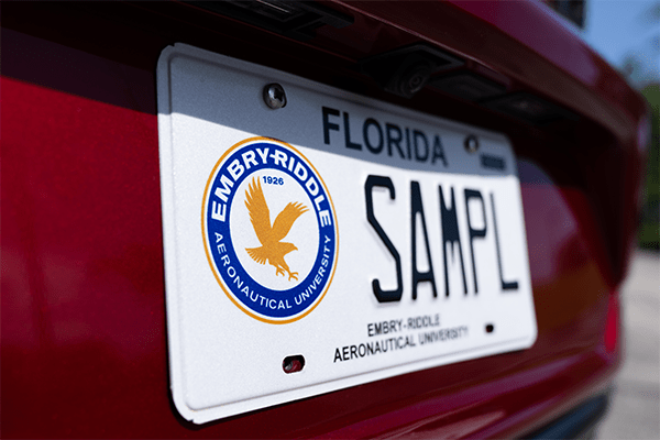 Embry-Riddle Florida license plate sample on a red car